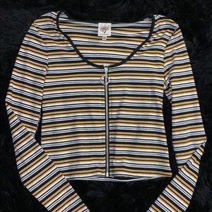 Long sleeve yellow, black, and white zip up shirt